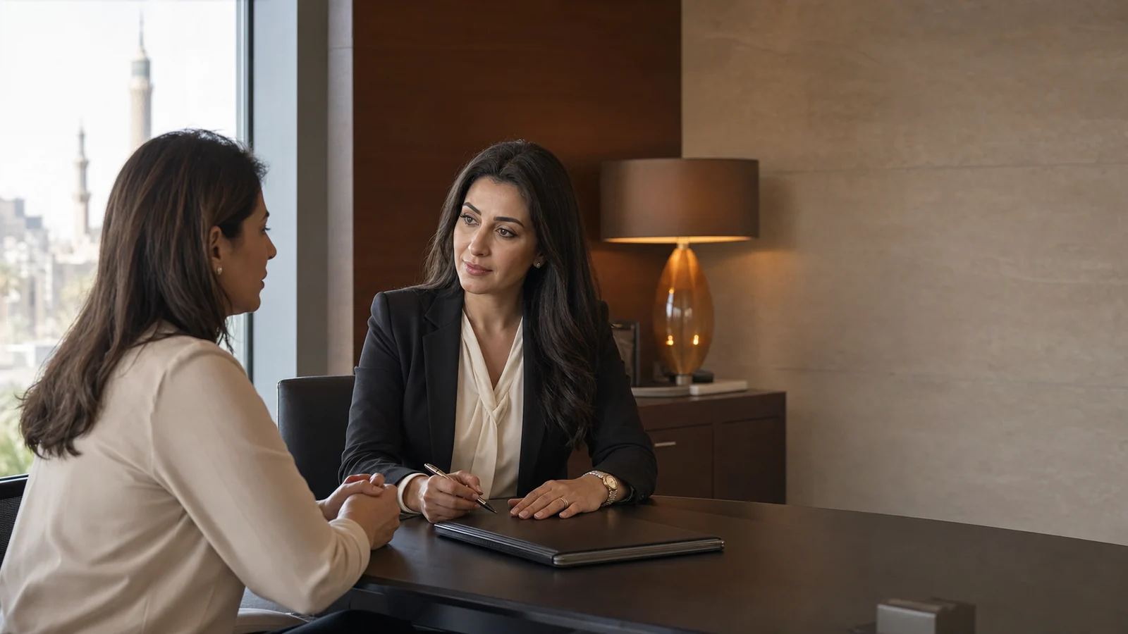 A Haq adviser speaking with a private client